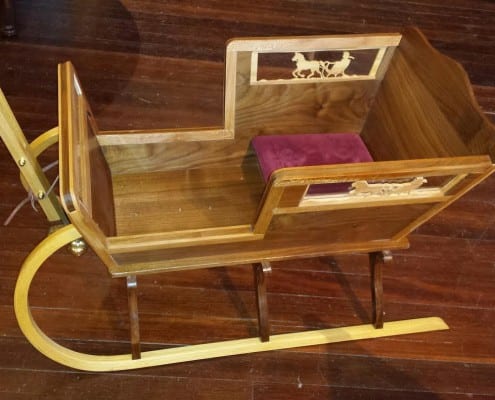 Handcrafted, hardwood sleigh by Ron Jackson