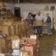 Dayton Community Food Bank volunteers sort through boxes of food donations